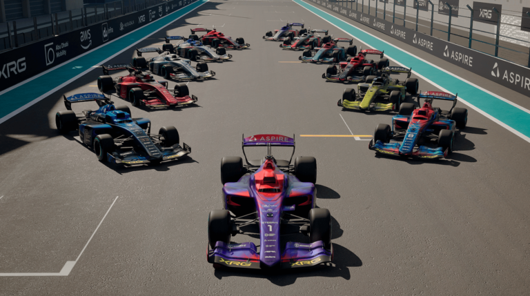A2RL launches SIM-Sprint Challenge virtual racing series Abu Dhabi Autonomous Racing League cars parked in formation on the track.