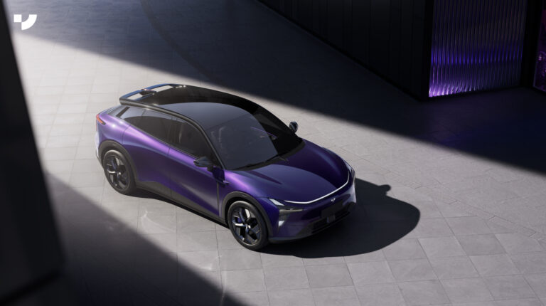 First global ISO/PAS 8800:2024 AI safety certification awarded to Geely A purple Geely robocar illuminated by a ray of light on a city street
