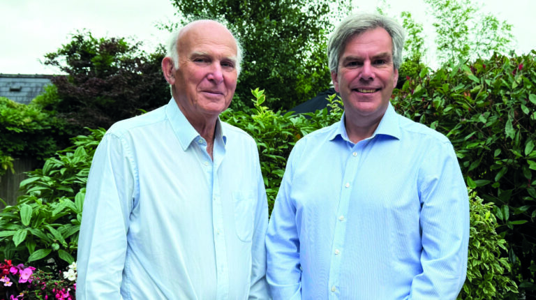 Sir Vince Cable and Michael Boxwell pictured standing together outside