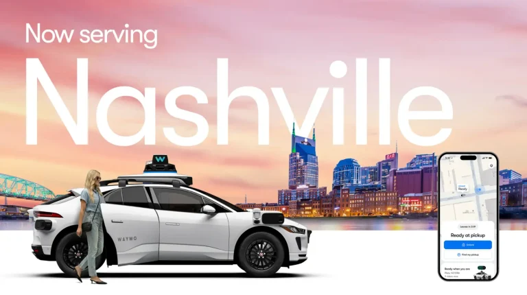 Waymo launches fully autonomous ride-hailing service in Nashville A white Waymo vehicle against the Nashville skyline and a pink sky.