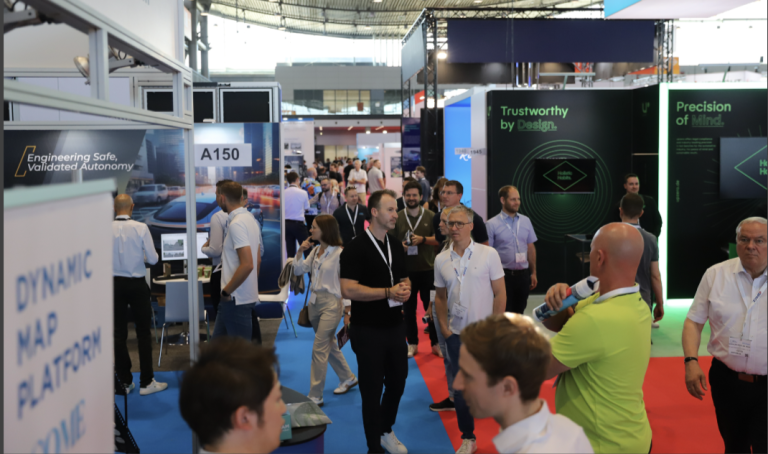 Show attendees visit various booths on the show floor at Autonomous Vehicle Tech Expo Europe 2026