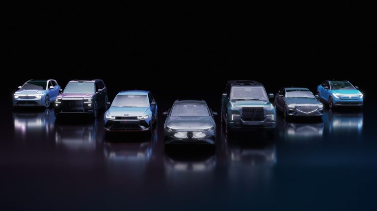 Nvidia expands Drive Hyperion Level 4-ready AV ecosystem A line of autonomous vehicles powered by Nvidia Drive Hyperion are parked in a line in a dark showroom.