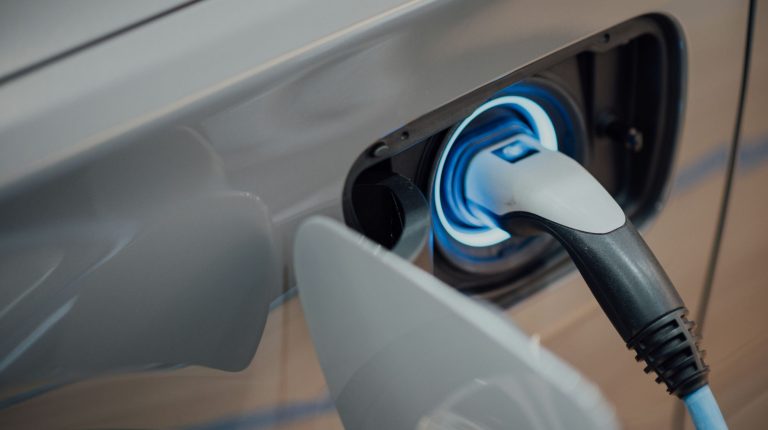 Close up of the charging point on an electric vehicle.