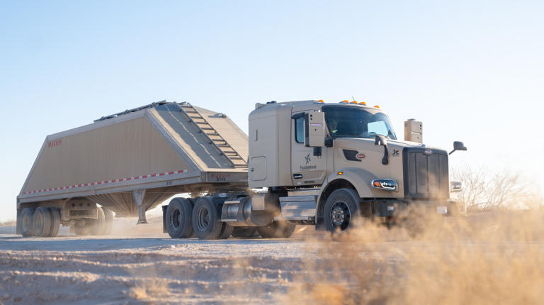 Atlas Energy Solutions expands Kodiak autonomous trucking fleet at US oil and gas basin An Atlas-owned Kodiak AV in operation in a dusty environment.