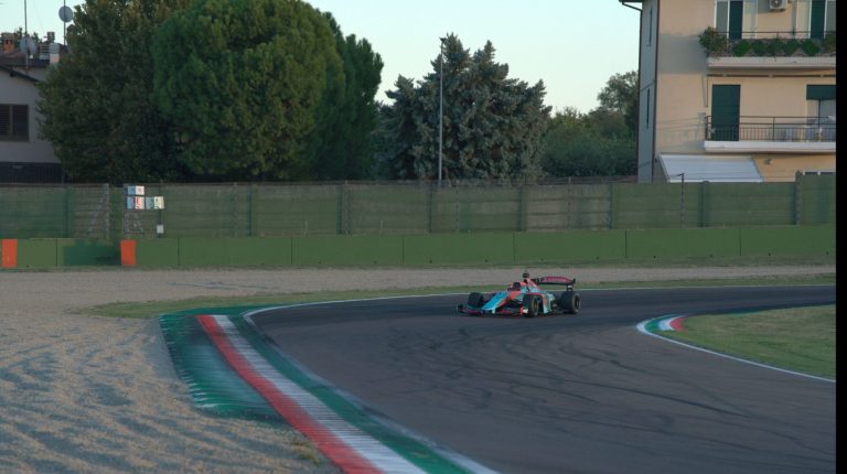 An autonomous race car drives around the circuit at Imola in Italy.