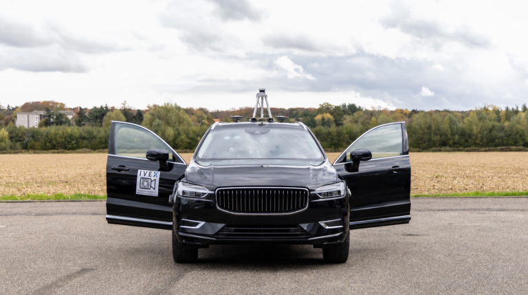 IVEX raises €5m to scale AI-based automotive safety testing A black IVEX safety testing vehicle parked on a test site with the two front doors open.