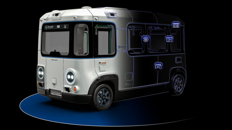 The Holon urban autonomous shuttle against a black background with company logos in front of it.